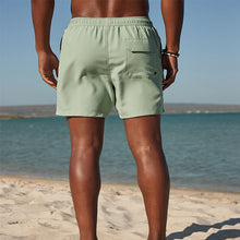 Load image into Gallery viewer, Light Green Palm Logo Essential Swim Shorts