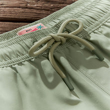 Load image into Gallery viewer, Light Green Palm Logo Essential Swim Shorts