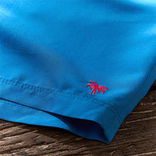 Load image into Gallery viewer, Cobalt Blue Palm Logo Essential Swim Shorts
