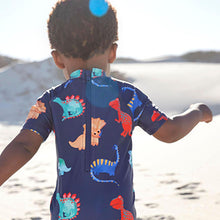Load image into Gallery viewer, Navy Dino Sunsafe Swimsuit (3mths-5yrs)