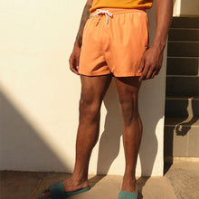 Load image into Gallery viewer, Light Orange Palm Logo Essential Swim Shorts