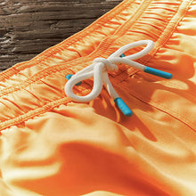 Load image into Gallery viewer, Light Orange Palm Logo Essential Swim Shorts