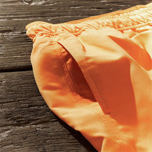 Load image into Gallery viewer, Light Orange Palm Logo Essential Swim Shorts