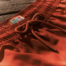 Load image into Gallery viewer, Rust Brown Palm Logo Essential Swim Shorts