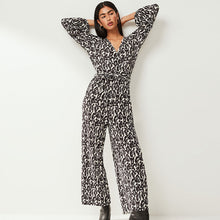 Load image into Gallery viewer, Black/White Long Sleeve Plisse Jumpsuit