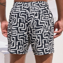 Load image into Gallery viewer, Black/White Printed Seersucker Swim Shorts