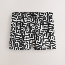 Load image into Gallery viewer, Black/White Printed Seersucker Swim Shorts