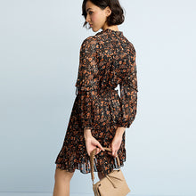 Load image into Gallery viewer, Black/Brown Floral Printed Chiffon Shirred Waist Ruffle Mini Dress