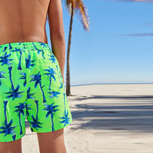 Load image into Gallery viewer, Fluro Green Palm Tree Swim Shorts (3-12yrs)