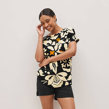 Load image into Gallery viewer, Black / Ecru White Floral Short Sleeve Curved Hem T-Shirt
