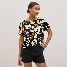 Load image into Gallery viewer, Black / Ecru White Floral Short Sleeve Curved Hem T-Shirt