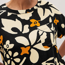 Load image into Gallery viewer, Black / Ecru White Floral Short Sleeve Curved Hem T-Shirt