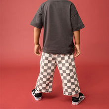 Load image into Gallery viewer, Black/White Checkerboard Pull On Wide Trousers (3mths-6yrs)