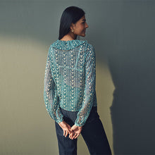 Load image into Gallery viewer, Teal Blue Print Sheer Ruffle Trim Tie Neck Blouse