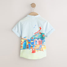 Load image into Gallery viewer, Blue Seaside Scene Short Sleeve Grandad Collar Printed Shirt (6mths-6yrs)
