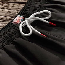 Load image into Gallery viewer, Black Palm Logo Essential Swim Shorts