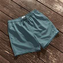 Load image into Gallery viewer, Slate Blue Palm Logo Essential Swim Shorts