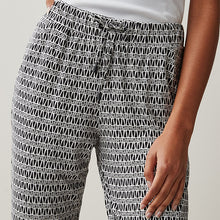 Load image into Gallery viewer, Black/White Geo Print Jersey Joggers
