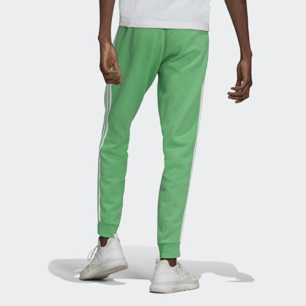 Adidas light clearance green track pants