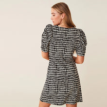 Load image into Gallery viewer, Black / White Ruched V-Neck Short Sleeve Midi Tea Dress