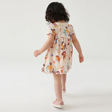 Load image into Gallery viewer, Cream Girl Character Short Sleeve Jersey Dress (3mths-6yrs)