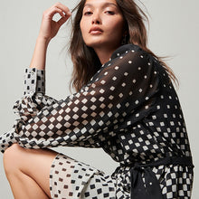 Load image into Gallery viewer, Monochrome Spot Tie Neck Belted Long Sleeve Mini Dress
