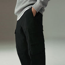 Load image into Gallery viewer, Black Regular Tapered Fit Tech Stretch Utility Cargo Trousers
