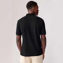 Load image into Gallery viewer, Black/White Vertical Stripe Quarter Zip Polo Shirt
