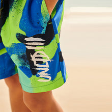 Load image into Gallery viewer, Blue/ Green Spray Paint Swim Shorts (3-12yrs)
