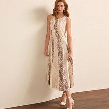 Load image into Gallery viewer, Neutral Snake Print Spliced Sleeveless Flowing Midi Dress
