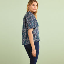 Load image into Gallery viewer, Blue Floral Textured Cotton Short Sleeve Tie Neck Blouse
