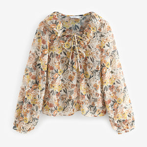Floral Print Sheer Ruffle Trim Tie Neck Blouse