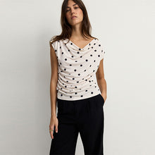 Load image into Gallery viewer, Ecru/Black Polka Dot Sleeveless Drape Top
