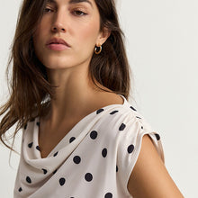 Load image into Gallery viewer, Ecru/Black Polka Dot Sleeveless Drape Top
