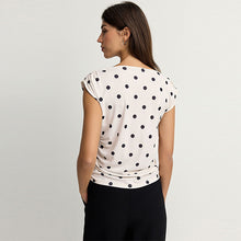 Load image into Gallery viewer, Ecru/Black Polka Dot Sleeveless Drape Top
