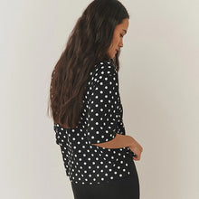 Load image into Gallery viewer, Black/White Polka Dot Relaxed Boxy Elbow Length Crew Neck T-Shirt
