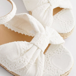 White Broderie Bow Wedge Sandals