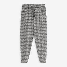 Load image into Gallery viewer, Black/White Geo Print Jersey Joggers
