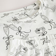 Load image into Gallery viewer, Monochrome Long Sleeve Gift Wrap Pyjamas
