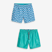 Load image into Gallery viewer, Turquoise Geo/ Plain Reversible Swim Shorts

