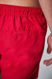 RED ESSENTIAL SWIM SHORTS - Allsport