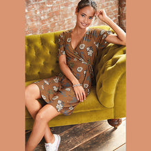 Load image into Gallery viewer, Tan Floral Crepe Wrap Dress - Allsport
