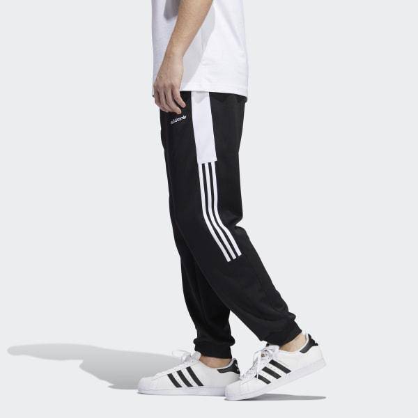 Adidas originals fakten hotsell track bottoms in black