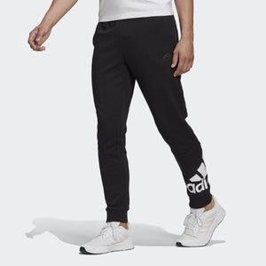 ESSENTIALS FRENCH TERRY TAPERED CUFF LOGO PANTS - Allsport
