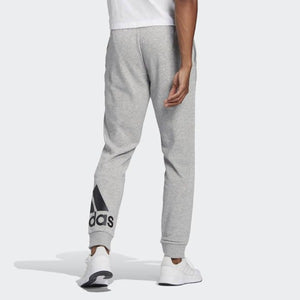 ESSENTIALS FRENCH TERRY TAPERED CUFF LOGO PANTS - Allsport