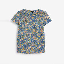 Load image into Gallery viewer, Blue Ditsy Floral Smock Neck Short Sleeve Top
