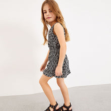 Load image into Gallery viewer, Black Printed Playsuit (3-12yrs)
