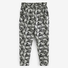 Load image into Gallery viewer, Black and White Floral Jersey Stretch Slouch Trousers (3-12yrs)
