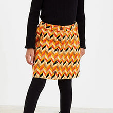 Load image into Gallery viewer, Orange Patterned Cord Skirt (3-12yrs)
